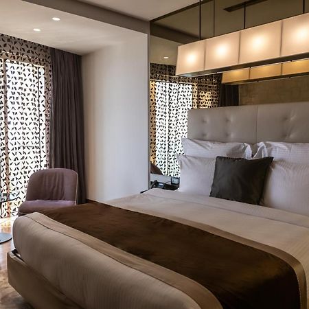 Lancaster Plaza Beirut Hotel Exterior photo A bedroom at the hotel