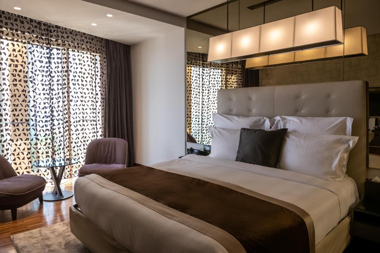 Lancaster Plaza Beirut Hotel Exterior photo A bedroom at the hotel