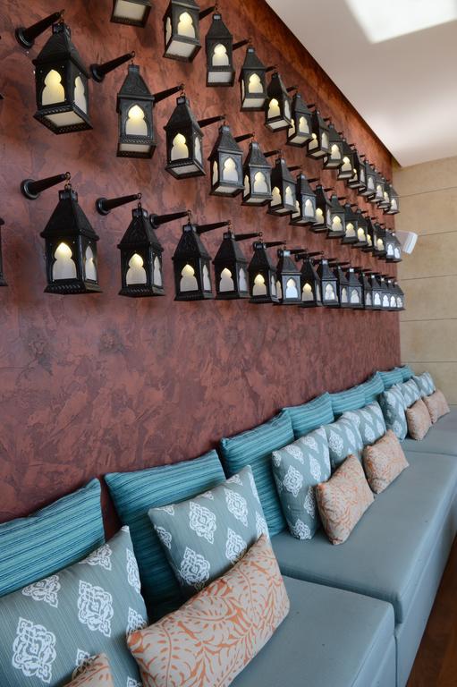 Lancaster Plaza Beirut Hotel Exterior photo A wall of lanterns at the hotel