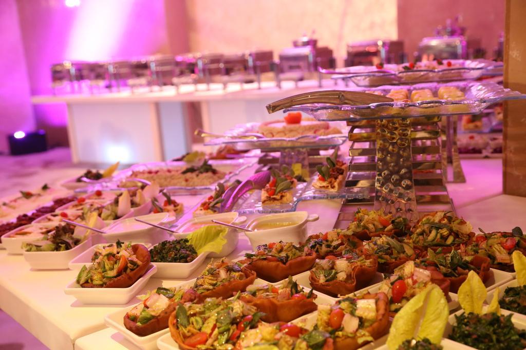 Lancaster Plaza Beirut Hotel Exterior photo A buffet of Lebanese cuisine