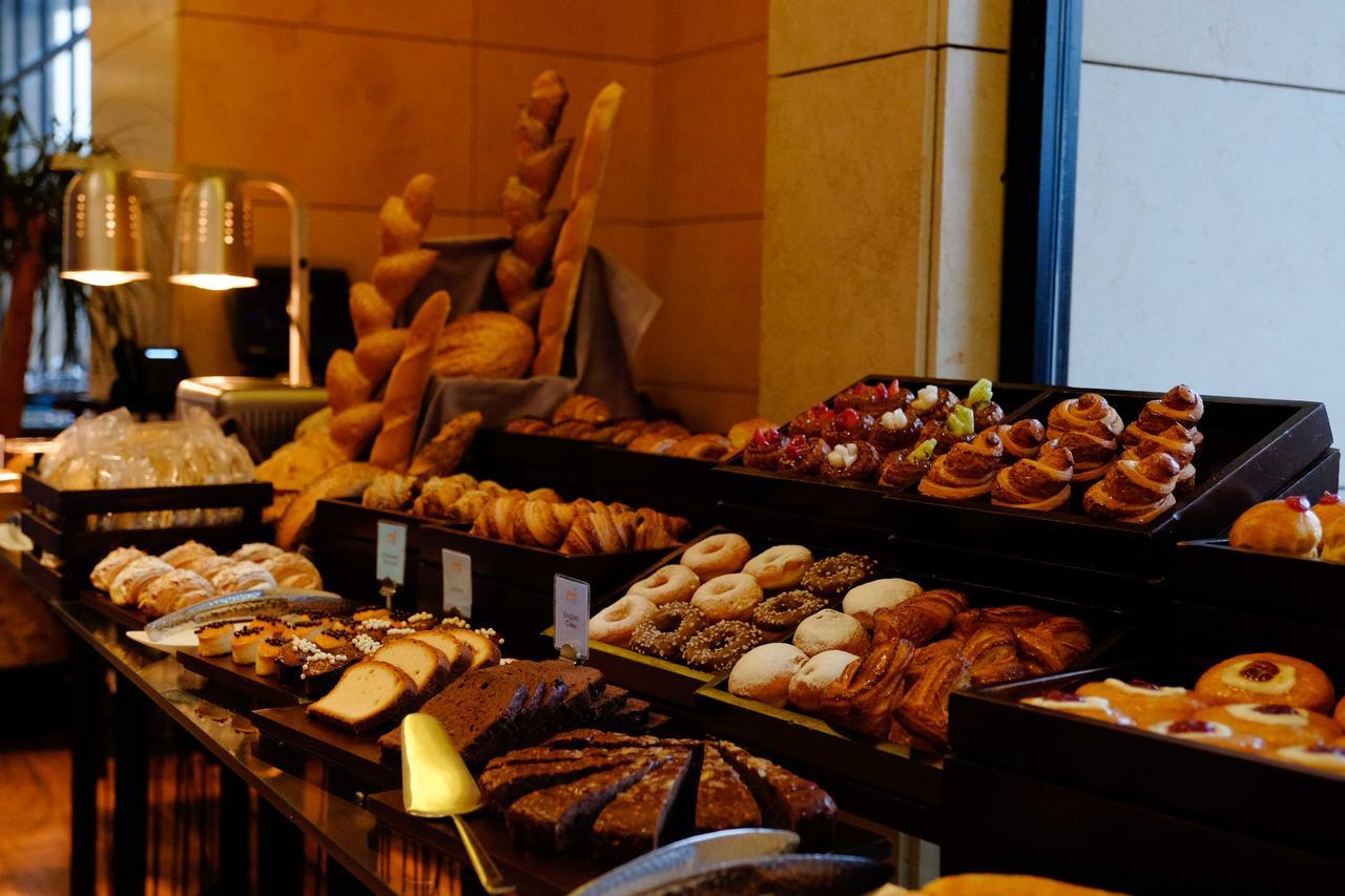 Lancaster Plaza Beirut Hotel Exterior photo A selection of breads and pastries