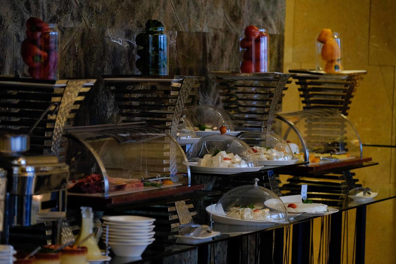Lancaster Plaza Beirut Hotel Exterior photo A buffet at a hotel